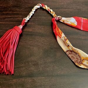 Elegant Hermes Red and Gold Scarf with Tassel Bag Charm